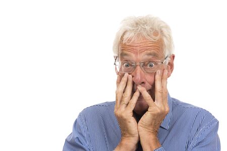 Portrait surprised senior man isolated against white backgroundの写真素材