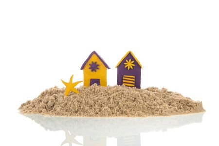 Island with colorful handmade beach cabins isolated over whiteの写真素材