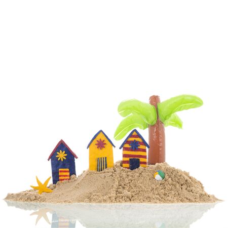 Island with colorful handmade beach cabins isolated over white backgroundの写真素材