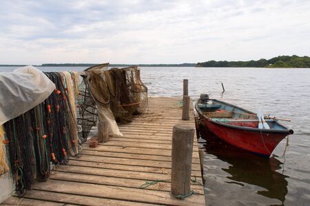 Fishing nets at lake Urbino at French island Corsicaの写真素材