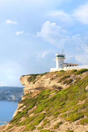 Lighthouse at coast on island Corsica near Bonifacioの写真素材