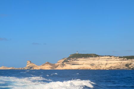Lighthouse at coast on island Corsica near Bonifacioの写真素材
