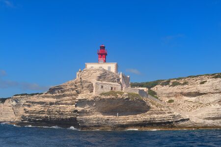 Lighthouse Madonetta at coast on island Corsica near Bonifacioの写真素材