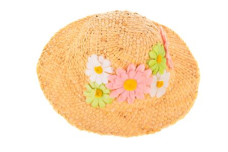 Straw summer hat with flowers isolated over white backgroundの写真素材