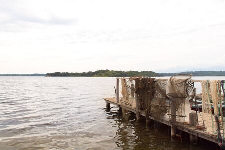Fishing nets at lake Urbino at French island Corsicaの写真素材