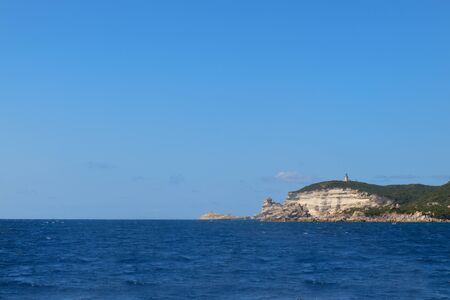 Lighthouse at coast on island Corsica near Bonifacioの写真素材