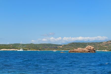 Rock formations and islands at south coast French Corsicaの写真素材