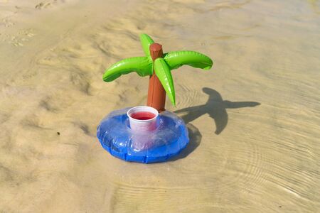 Inflatable Palm tree with cocktail drinkの写真素材