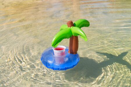 Inflatable Palm tree with cocktail drinkの写真素材