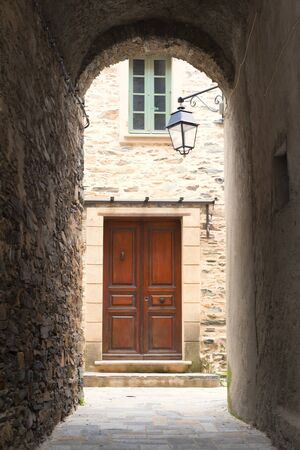 Corsica Looking through with arche Penta di Casinca in Franceの写真素材