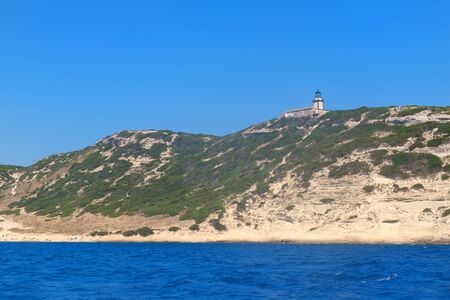 Lighthouse at coast on island Corsica near Bonifacioの写真素材