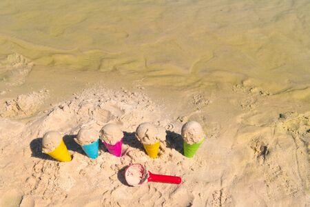 Plastic toys for ice creams at the beachの写真素材