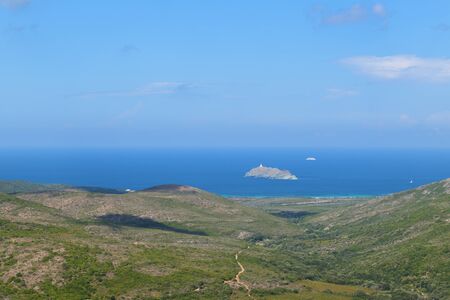 Landscape French island Giraglia with lighthouse near Corseの写真素材