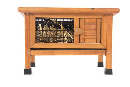 Rabbit hutch with straw isolated over white backgroundの写真素材