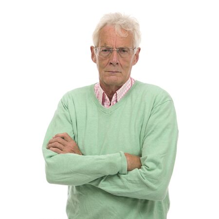 Angry senior man isolated over white backgroundの写真素材