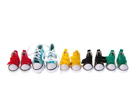 Colorful row canvas sneakers isolated over white backgroundの写真素材