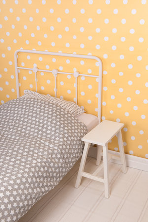 Yellow Bedroom with single bedの写真素材