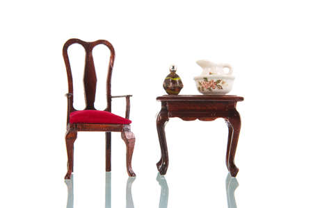 Queen ann style table and chair isolated over white backgroundの写真素材
