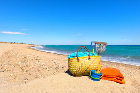 Beach bag and toys for summer vacationの写真素材