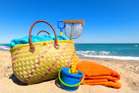 Beach bag and toys for summer vacationの写真素材