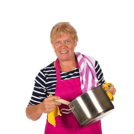 Elder woman with pin roller and apron isolated ovr white backgroundの写真素材
