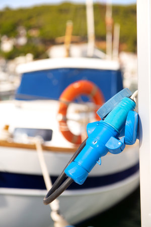 Blue Power plug for electricity in harborの写真素材