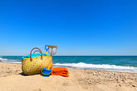 Beach bag and toys for summer vacationの写真素材