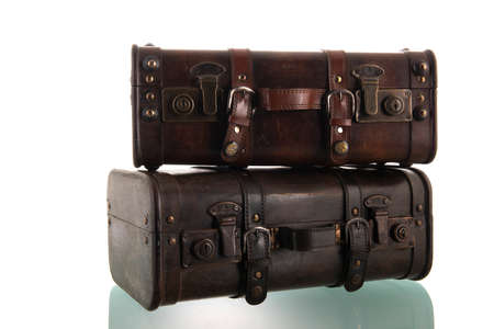 Two vintage suitcases isolated over white backgroundの写真素材