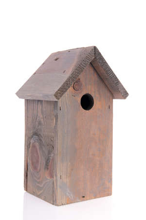 Bird nest box isolated over white backgroundの写真素材