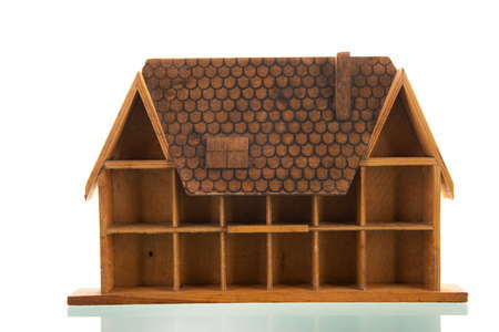 Wooden open house isolated over white backgroundの写真素材