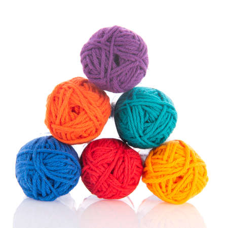 Blue knitting wool isolated over white backgroundの写真素材