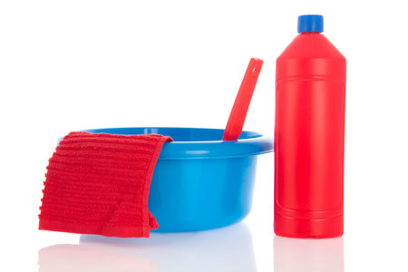 Blue plastic washing up bowl isolated over white backgroundの写真素材