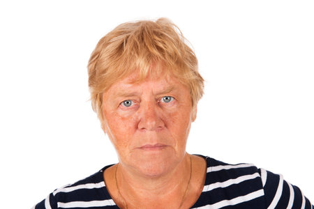 Portrait blonde senior woman on white backgroundの写真素材