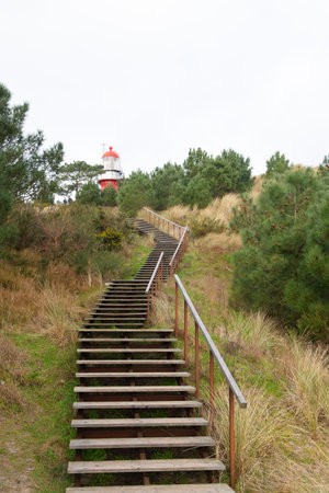 Red lighthouse on Dutch wadden island Vlielandの写真素材