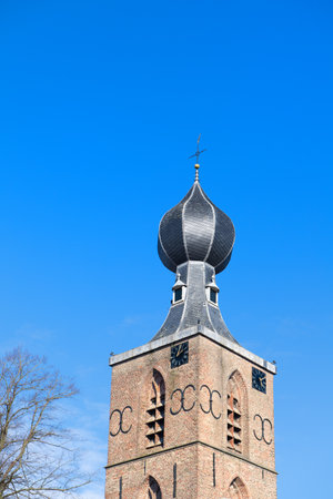 Dutch church tower in Dwingeloo in the Netherlandsの写真素材