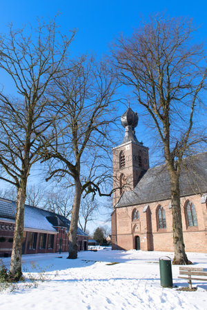 Dutch church in Dwingeloo in the Netherlands in winter timeの写真素材