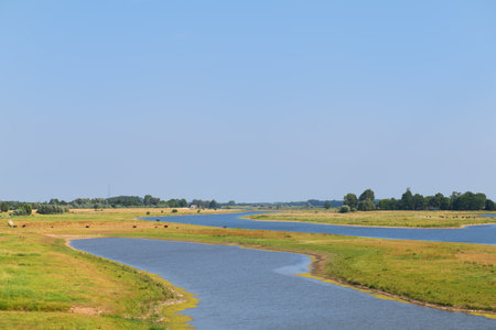 Landscape river the IJssel in Holland taken from the red bridge
