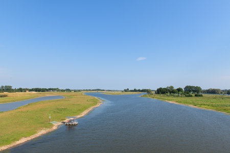 Landscape river the IJssel in Holland taken from the red bridgeの写真素材