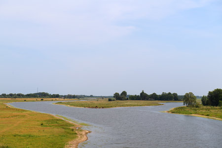 Landscape river the IJssel in Holland taken from the red bridgeの写真素材