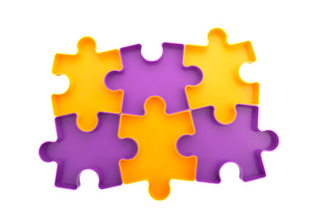 Puzzle in orange and purple isolated over white backgroundの写真素材