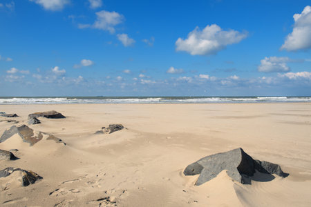 Beach landscape with rock in the foregroundの写真素材