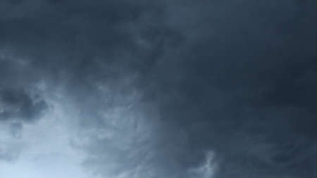 sky background. rainy weather. Dark storm sky clouds. soft focus. Space for text.