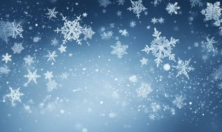 Falling snowflakes on blue background. Blurred snowflakes. Christmas background.の素材