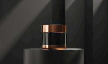 Cosmetic cream bottle on black background.の素材