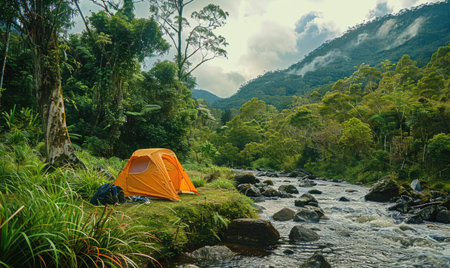 Camping in the jungle with a view of the mountain river.の素材