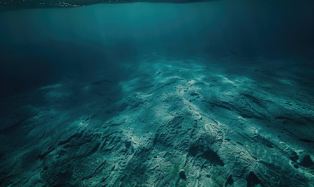underwater scene with sun rays and seafloorの素材