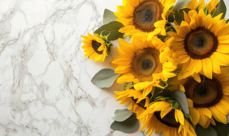 Top view of a white marble countertop, wreath of sunflowersの素材