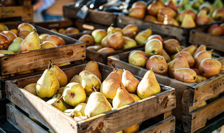 Pears in wooden crates at a farmers' marketの素材