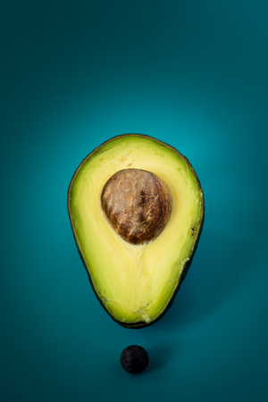 Avocado on blue background