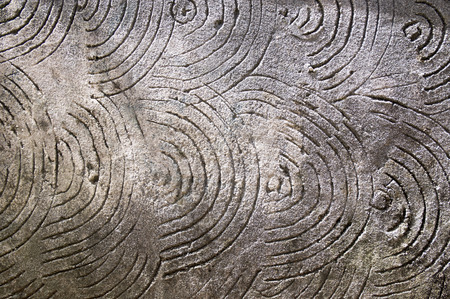 Grey background with circles and spiralsの写真素材